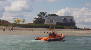 Air ambulance landing with Hayling Rescue boat