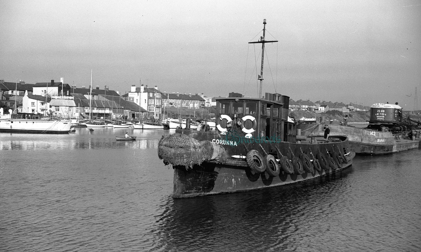 Tug and hopper approaching lock, Shoreham Harbour, Sussex, 2 October 1957 - Old photos SM Tidy - click image below to return