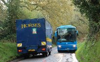 school coach squeezes down lane - Linch 2013