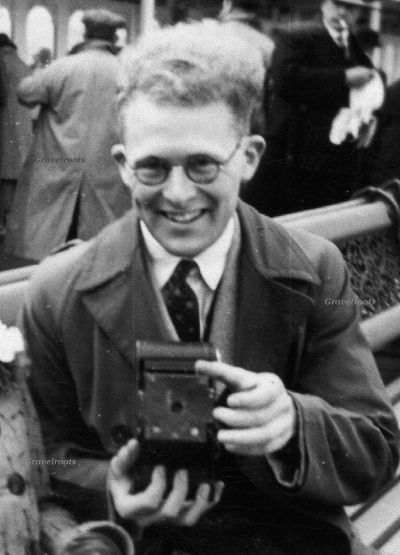 Leslie Whitcomb with his first camera - click to enlarge